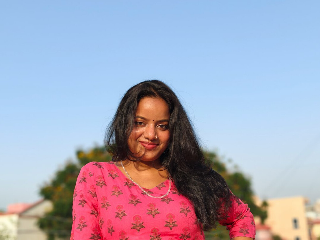 Portrait of a smiling woman with long hair